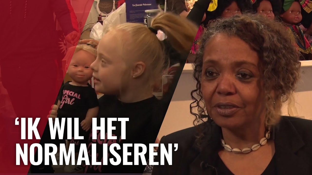 Pop met Downsyndroom te koop in speelgoedwinkel