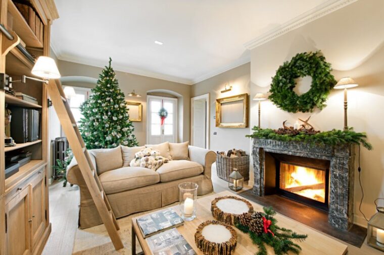Wonderful-christmas-decor_living-room-decor_fireplace_cream-fabric-sofa_cream-wall-color_natural-christmas-tree_best-lliving-room-lighting_indoor-plant-decor-805x536